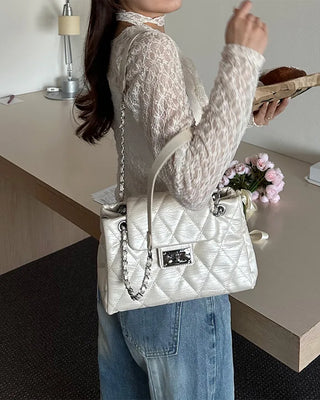 Quilted buckle mini shoulder bag
