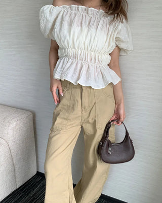 Feminine gathered off-shoulder blouse
