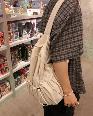 Drawstring pocket backpack