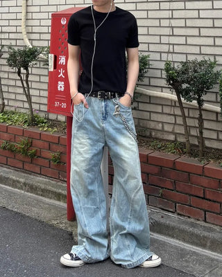 Curved silhouette denim pants