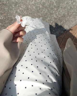 Polka dot asymmetrical midi skirt