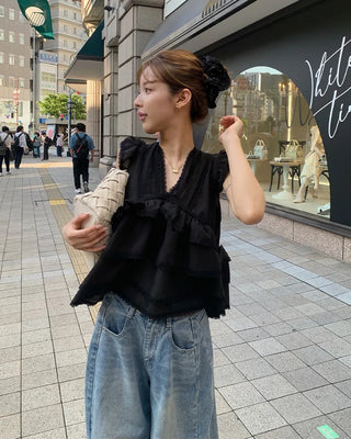 Can-can volume sleeveless blouse
