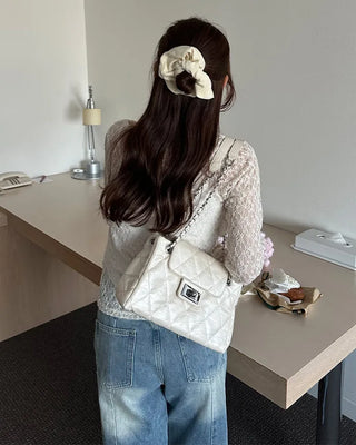 Quilted buckle mini shoulder bag