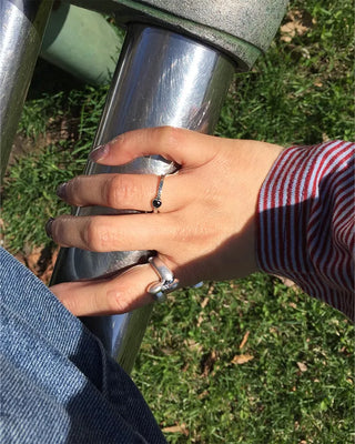 Curved knot ring