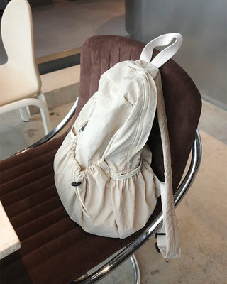 Drawstring pocket backpack
