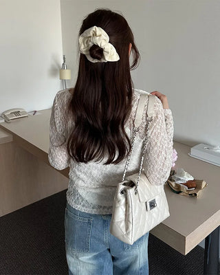 Quilted buckle mini shoulder bag