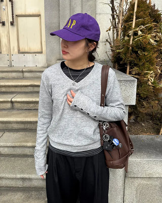 Drape-form buckle shoulder bag
