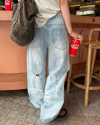Distressed wide-leg denim