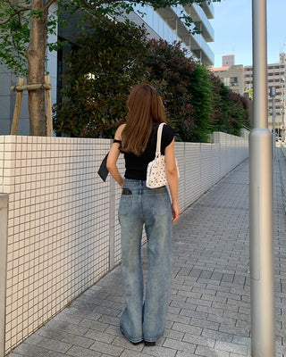 One-shoulder ribbon detail shirred blouse