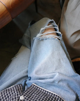 Distressed wide-leg denim pants
