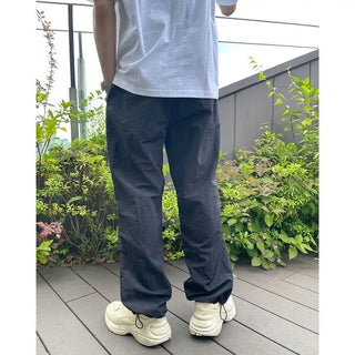 Two-pleat detail string pants