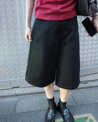 Side-button Bermuda shorts