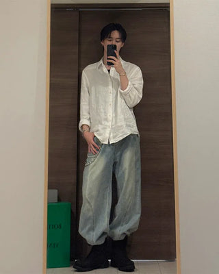 Curved silhouette denim pants