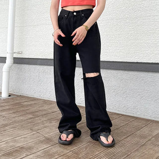 Distressed black denim pants