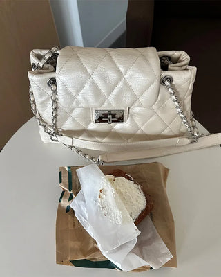 Quilted buckle mini shoulder bag