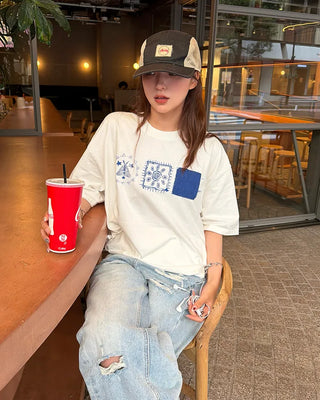 Distressed wide-leg denim