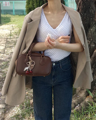 V-neck polka dot sleeveless top