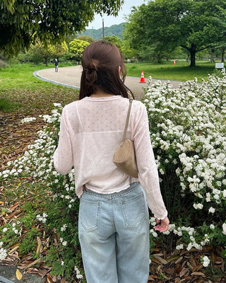 See-through perforated cardigan