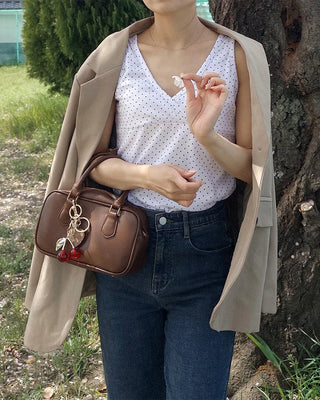 V-neck polka dot sleeveless top