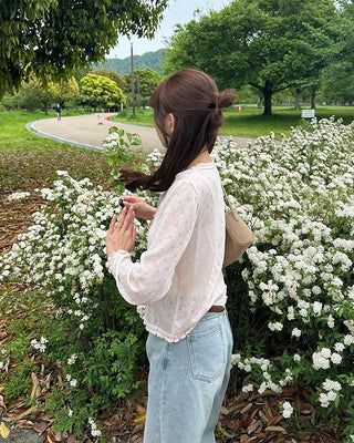 See-through perforated cardigan