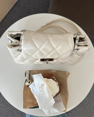 Quilted buckle mini shoulder bag