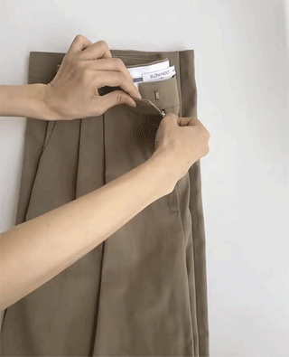 Wide cotton slacks with pleats