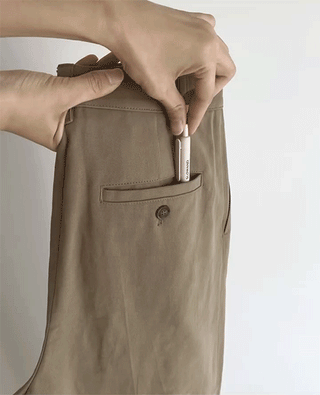 Wide cotton slacks with pleats