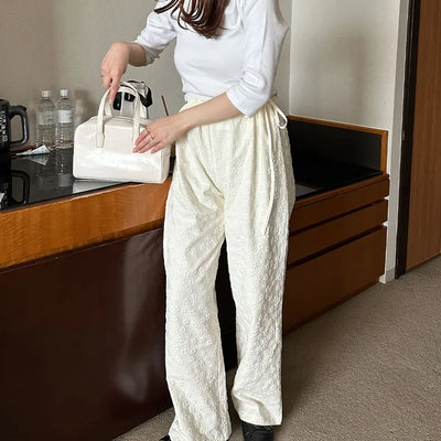 Flower embossed pants
