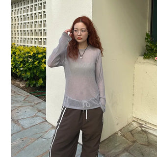 Sheer, languid long sleeveless top
