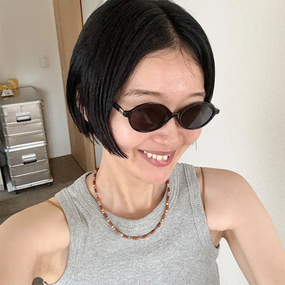 Tinted oval sunglasses