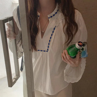 Lace-trimmed blouse top