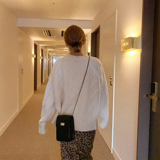 Cable knit round neck sweater