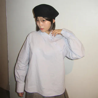 Cross-button blouse