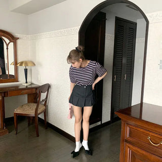 Pleated denim mini skirt