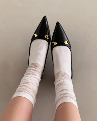 Pointed-toe slingback pumps