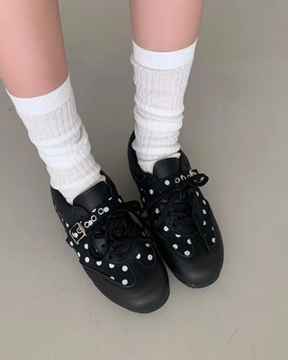 Sneakers with polka dot buckles