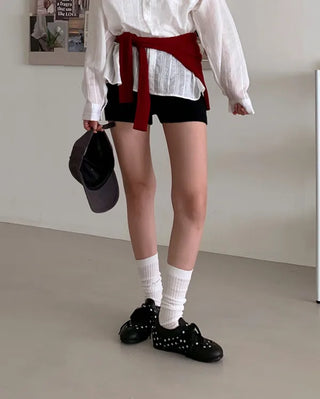 Sneakers with polka dot buckles