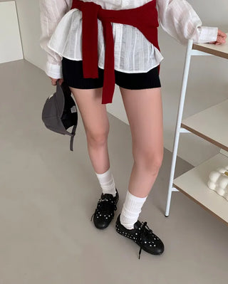 Sneakers with polka dot buckles