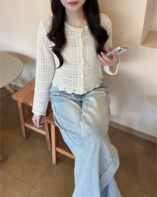 Wave punching cardigan