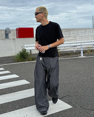 Side-tuck denim slacks