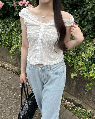 Frilled hem sleeveless blouse