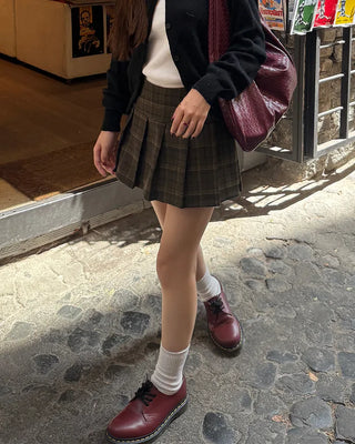 Checkered button pleated mini skirt