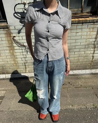 Distressed wide-leg denim pants