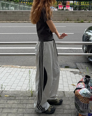 Side Round Point Windbreaker Pants