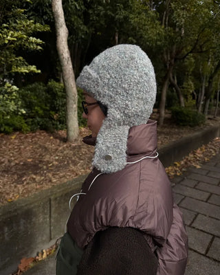 Knit hat with button ear flaps