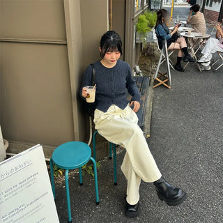 Tucked wide-leg pants