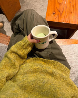 Henley neck round long knit