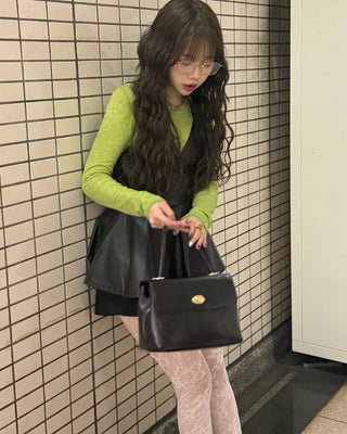 One-button leather handbag