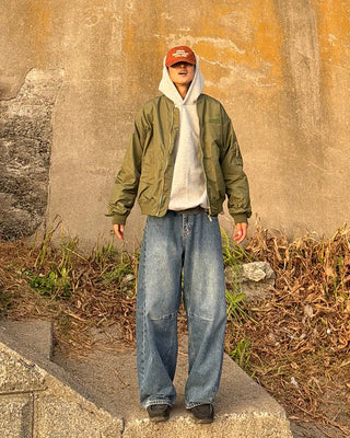 Pointed denim pants with contrasting panels