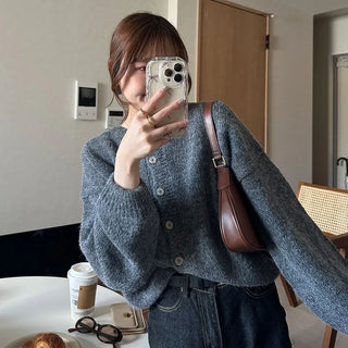Loose-fitting button-up wool cardigan